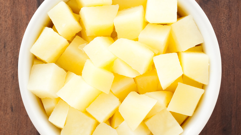 Overhead view of boiled potato cubes