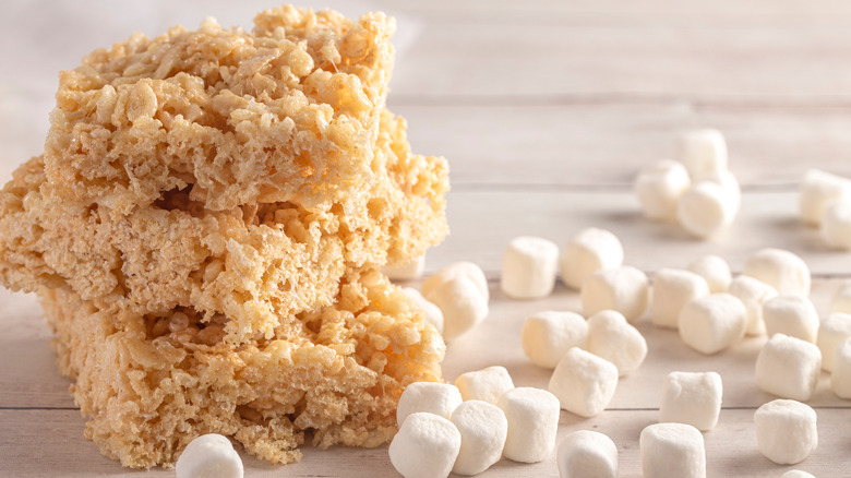 Rice Krispies Treats stacked beside mini marshmallows