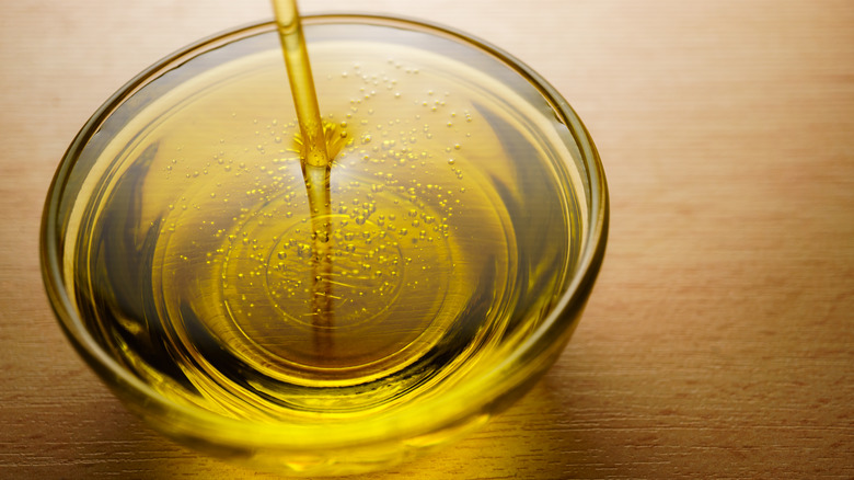 close up of a bowl of sunflower oil