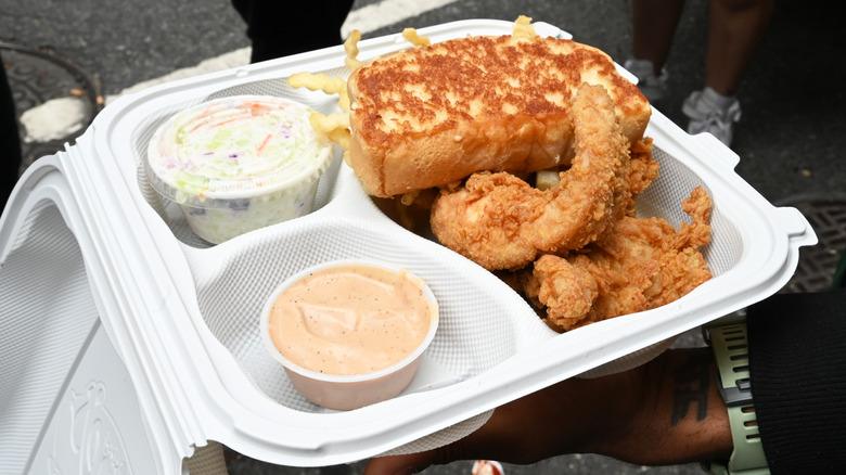 Raising Cane's meal in white takeout box