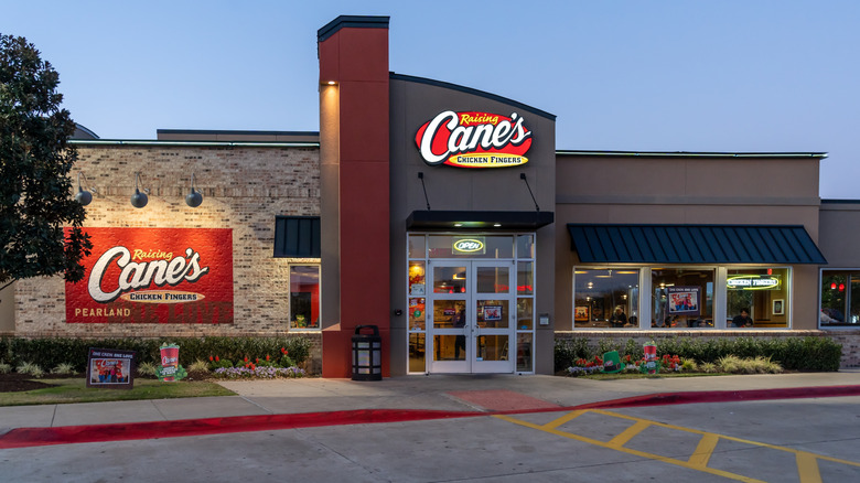 Raising Cane's location exterior at dusk