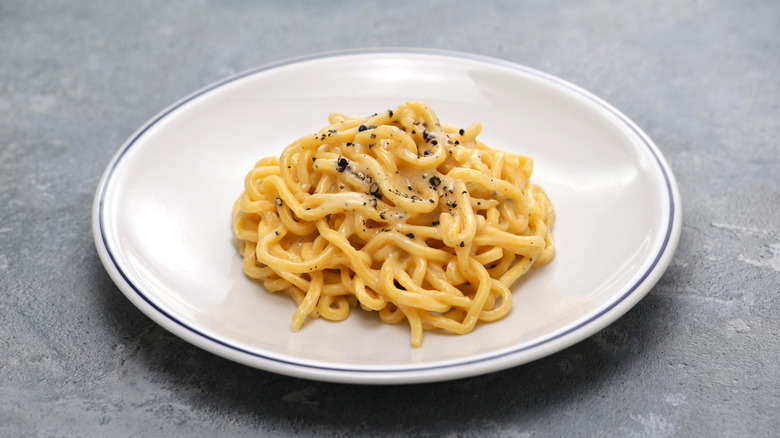 White plate of cacio e pepe