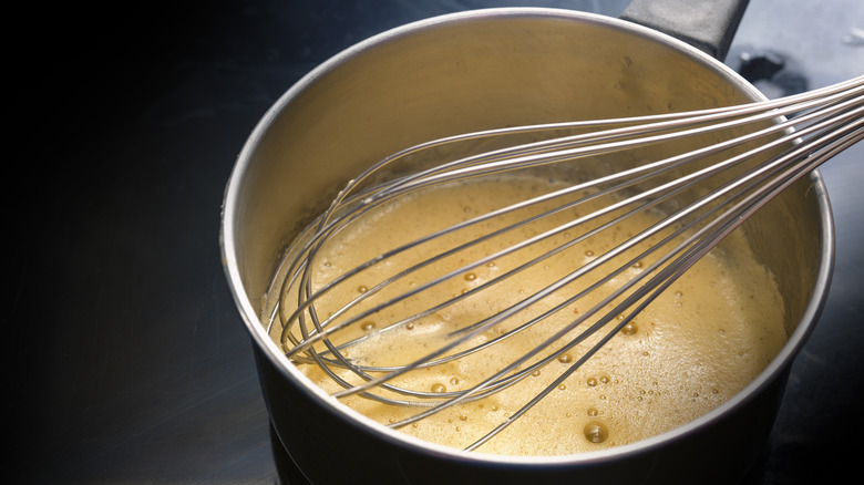 Frothy butter mixture in pan