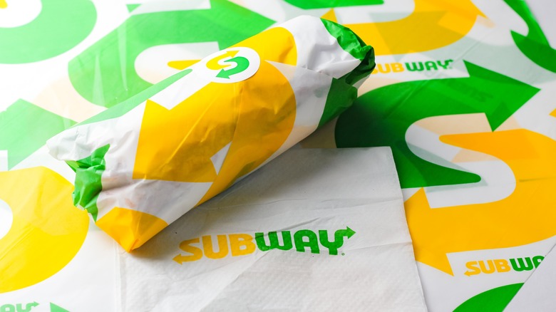 Subway sandwich and napkin