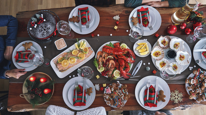 A fancy Christmas Eve table set with the Feast of the Seven Fishes