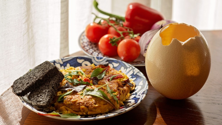 Ostrich egg breakfast alongside shell