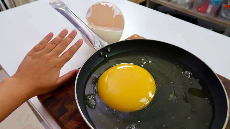 Ostrich egg in pan