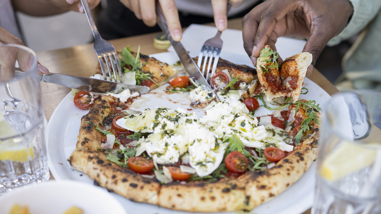 People eating pizza