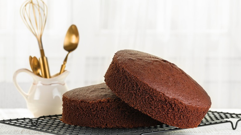 Chocolate sponge cakes lopsidedly stacked