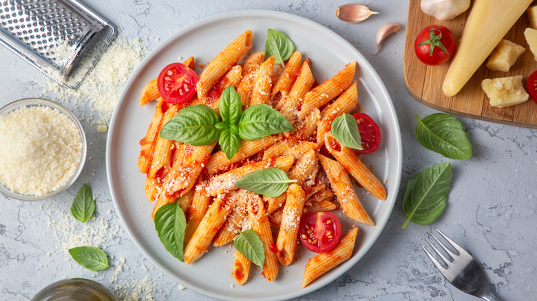 pasta dish surrounded by ingredients