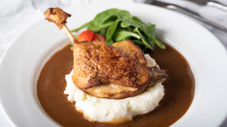 Duck confit over mashed potatoes