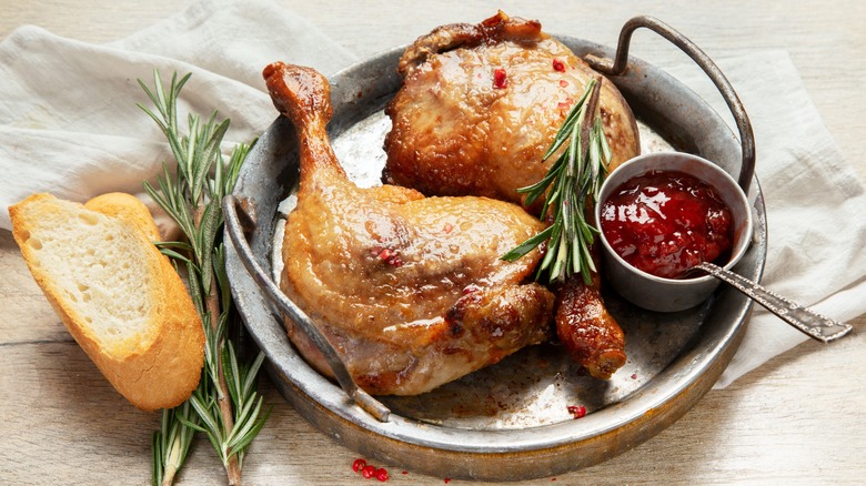 Duck confit with cranberry sauce