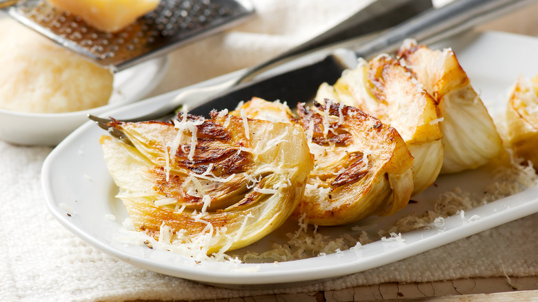 Roasted fennel topped with grated parmesan cheese.