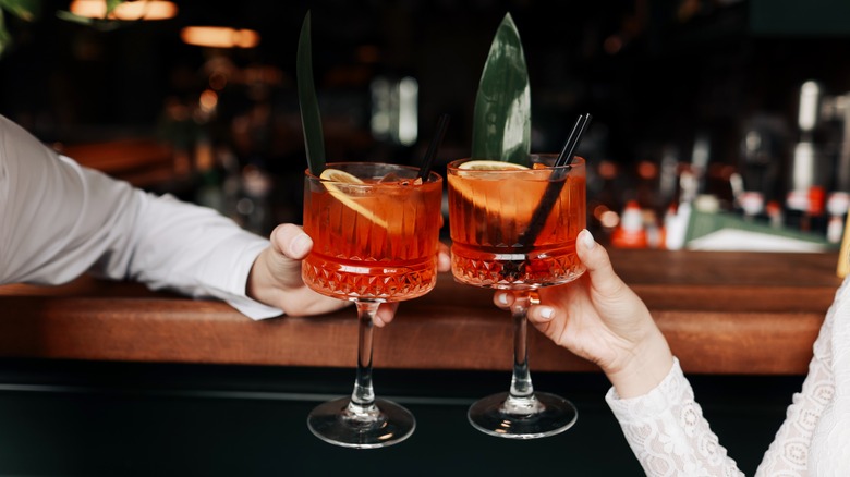 drinkers enjoying spritz cocktail