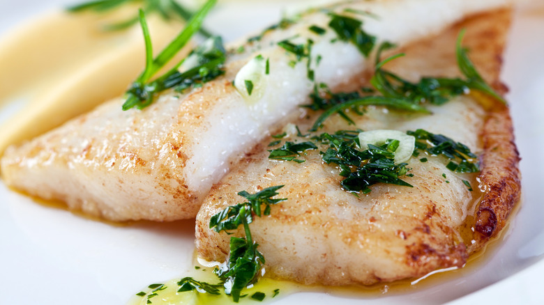 Tender and juicy poached white fish