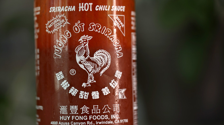 A bottle of sriracha