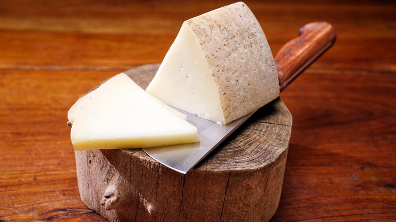 A wedge of Pecorino Romano.