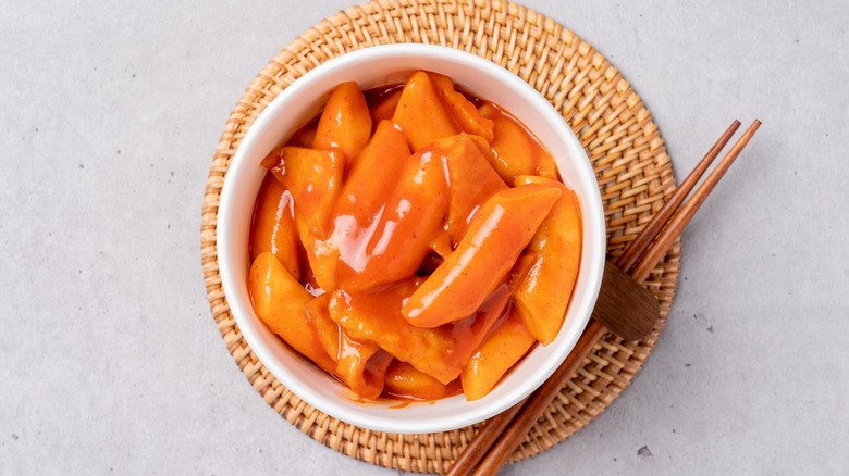 Bowl of tteokbokki with chopsticks