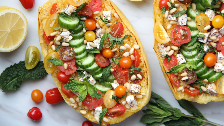 Spaghetti squash stuffed with fresh vegetables and herbs