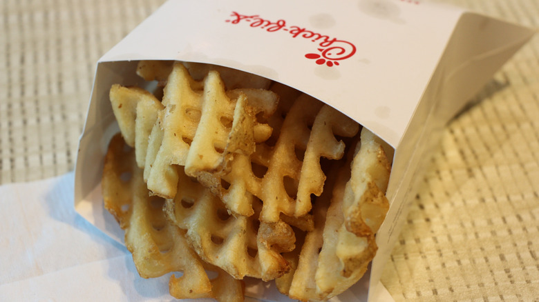 Chick-fil-A waffle fries on top of a napkin