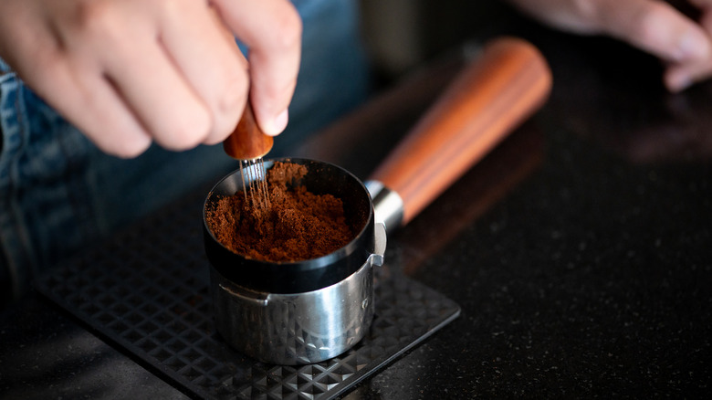 Hand sifting espresso powder