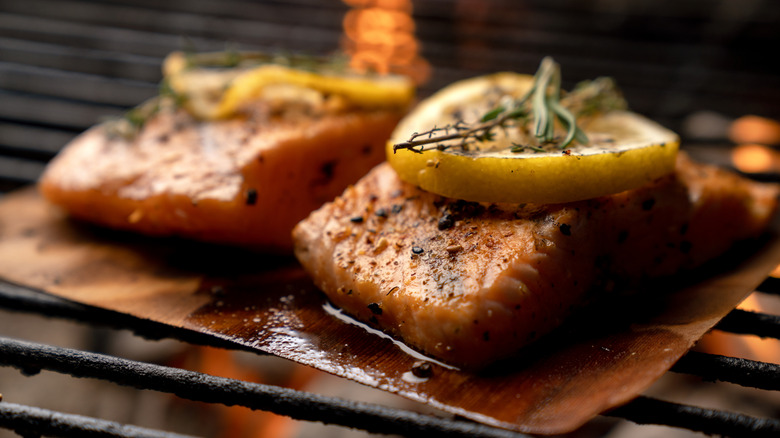 salmon on grill with lemon