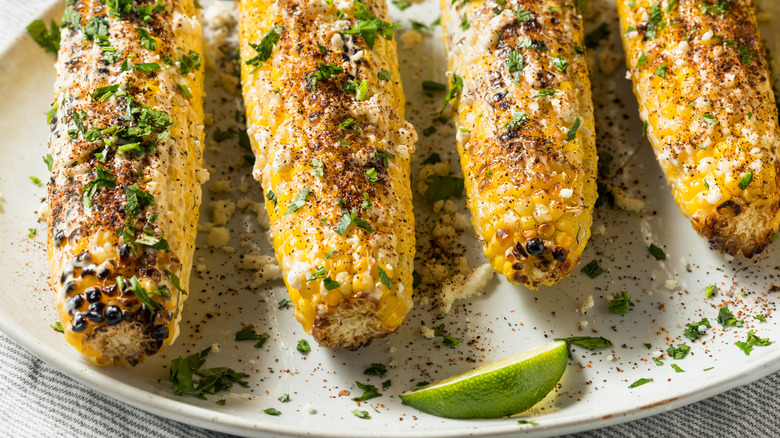 Elote on a white platter