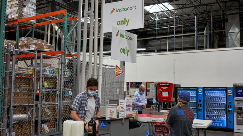 People at Costco Instacart-only checkout
