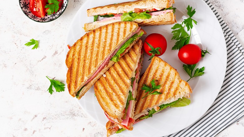 Hot club sandwich on plate