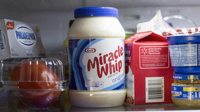 Jar of Miracle Whip on fridge shelf