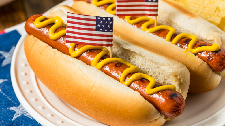 Hot dogs in buns with mustard