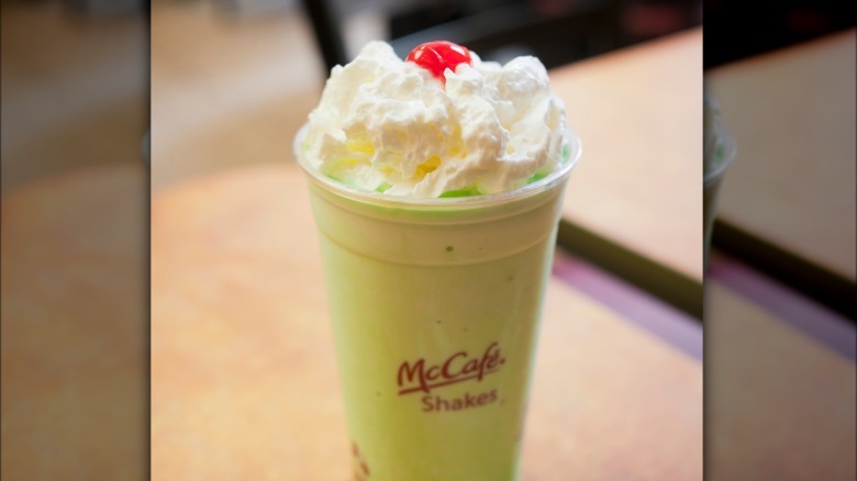 McCafe Shamrock Shake with whipped cream and cherry on top