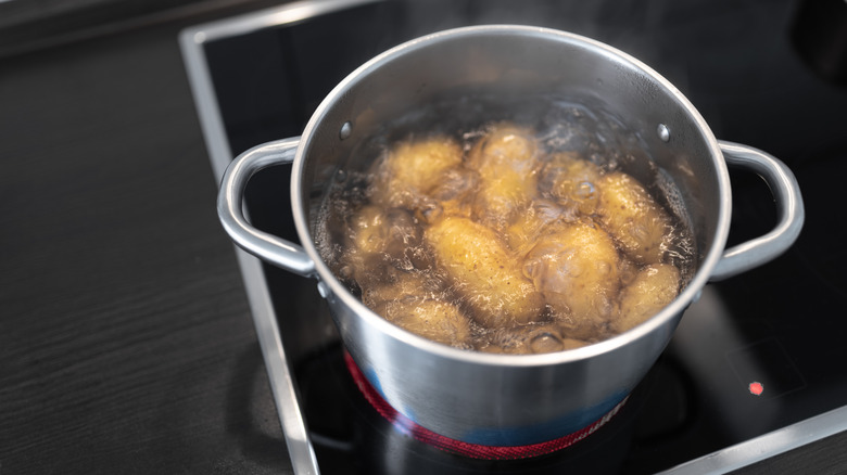 Potatoes boiling in a pot