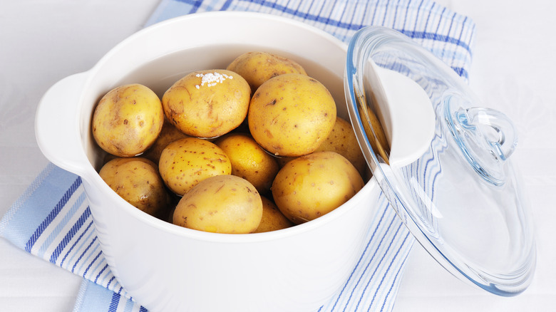 Potatoes in pot of water