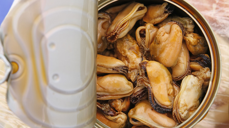 Open can of oysters