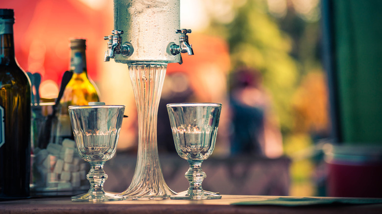 An absinthe fountain and two glasses