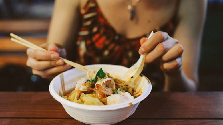 Pad Thai with shrimp and red curry noodles 