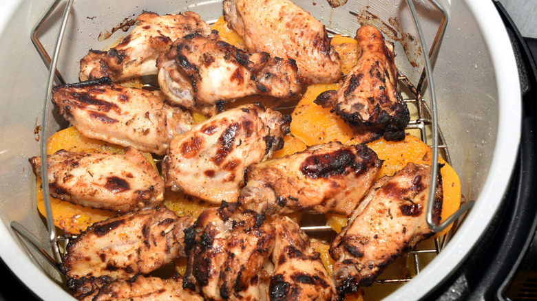 Chicken resting in a slow cooker