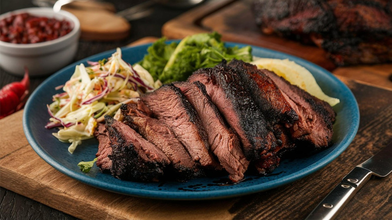 A heaping plate of brisket with sides.