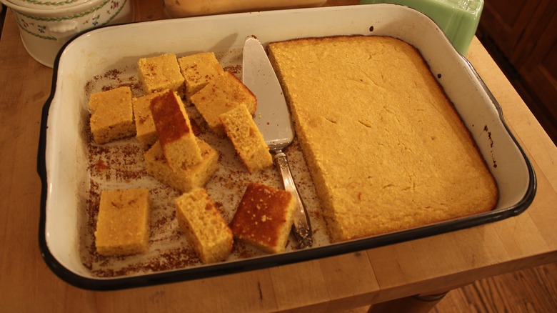 pan of sliced and cubed cornbread