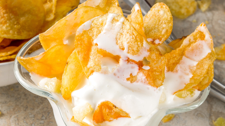Potato chips in melting vanilla ice cream