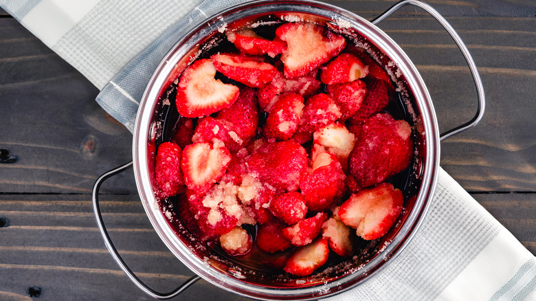 Strawberries in a pot with sugar