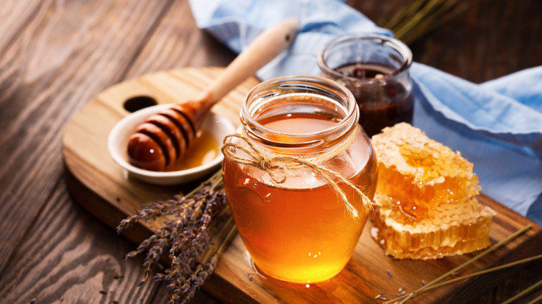 Jar of honey on tray