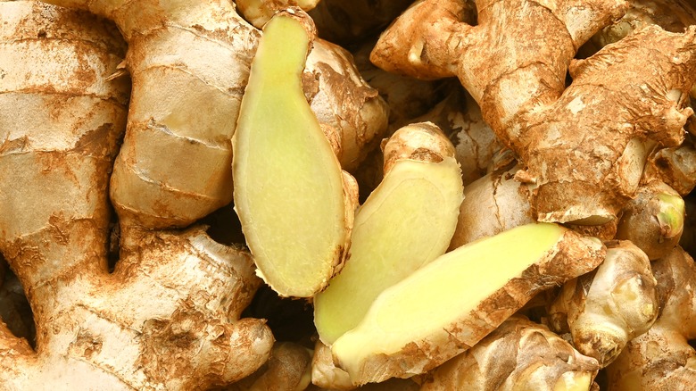 Sliced and whole raw ginger