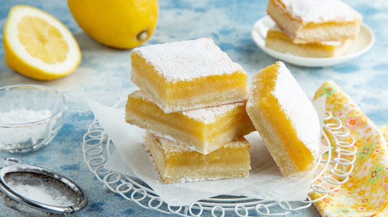 lemon bars stacked on plate