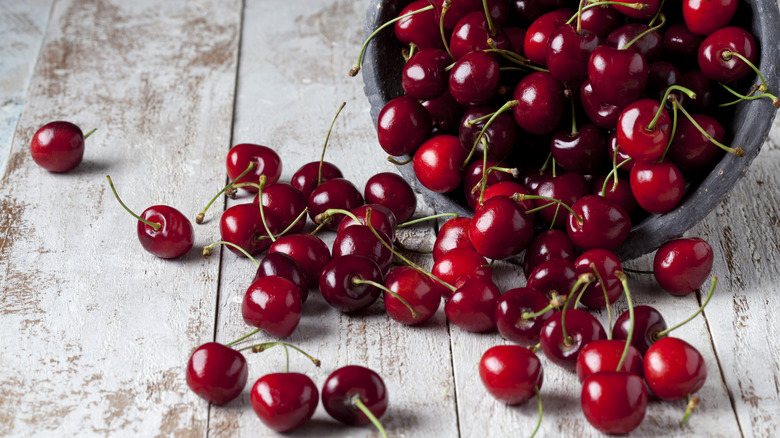 cherries spilling out of bowl