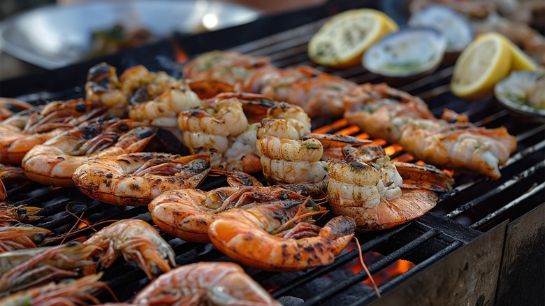 Unpeeled shrimp on grill