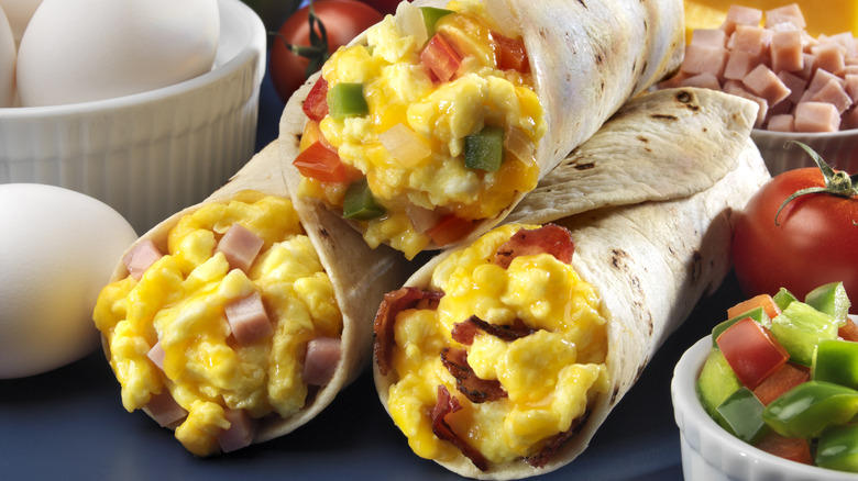 3 stacked breakfast burritos