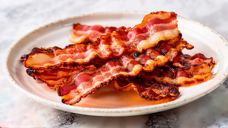 Plate of crispy bacon strips