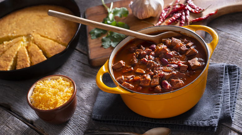 Pot of chili with cornbread